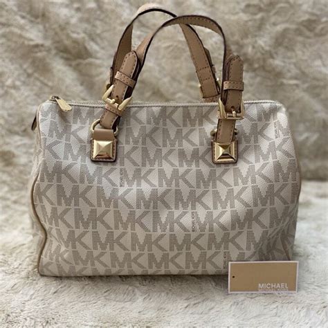 como identificar bolsa original michael kors|bandolera michael kors outlet.